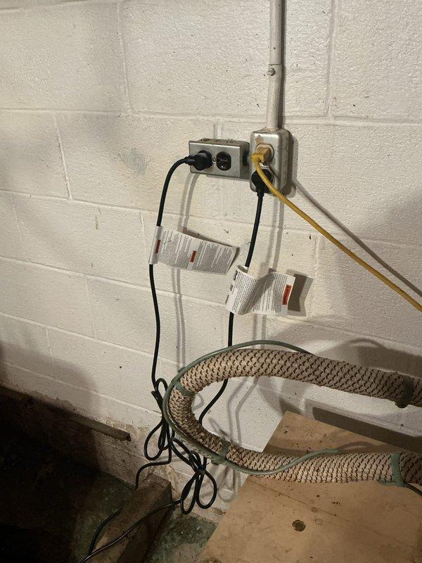 Replaced both sump pumps in split crock system located in basement utility area. Removed existing pumps from below-grade sump pit and installed new replacement units with proper electrical connections and discharge piping. System tested and operational upon completion.