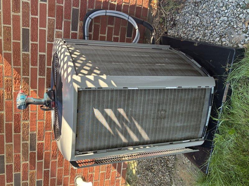 Completed scheduled preventive maintenance cooling visit on one-year-old residential air conditioning system. Performed comprehensive inspection of outdoor condensing unit, verified proper operation of dual run capacitor with all electrical connections secure, and confirmed system functionality with no deficiencies noted.