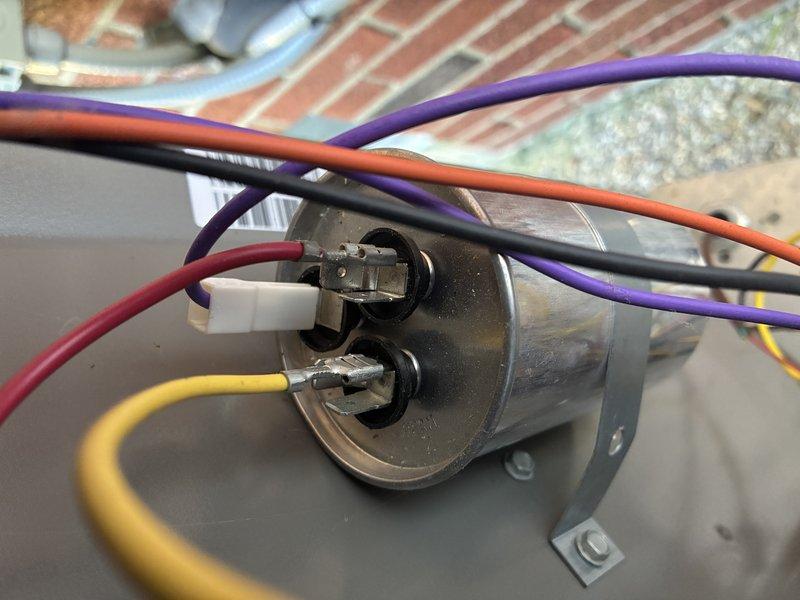 Completed scheduled preventive maintenance cooling visit on one-year-old residential air conditioning system. Performed comprehensive inspection of outdoor condensing unit, verified proper operation of dual run capacitor with all electrical connections secure, and confirmed system functionality with no deficiencies noted.
