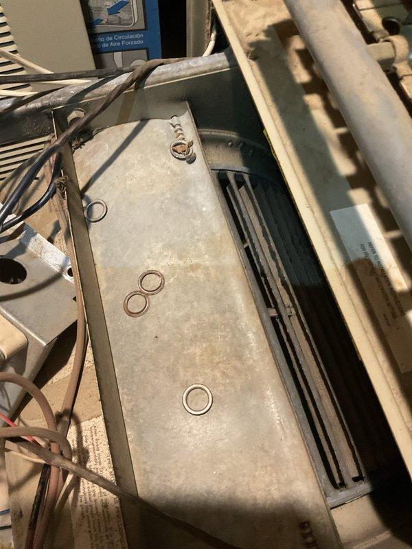 Responded to no heat call on 15-year-old furnace displaying high limit switch error code. Attempted repair by replacing faulty 195L-20F high limit switch with available 170L-20F unit. After replacement, system continued to display same error code and failed to produce heat. Performed electrical system reset at breaker panel, but issue persisted. Documented burner assembly operation and internal components. Unit requires further diagnostic work to identify underlying cause of repeated high limit tripping beyond switch replacement.