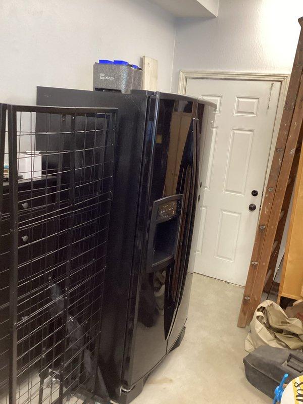 Responded to service call for circuit breaker tripping after garage refrigerator installation. Inspected electrical panel and identified overloaded circuit causing nuisance tripping. Evaluated existing breaker configuration and wiring conditions within main service panel. Determined dedicated circuit was required for refrigerator load to prevent continued breaker trips and ensure safe operation of appliance.