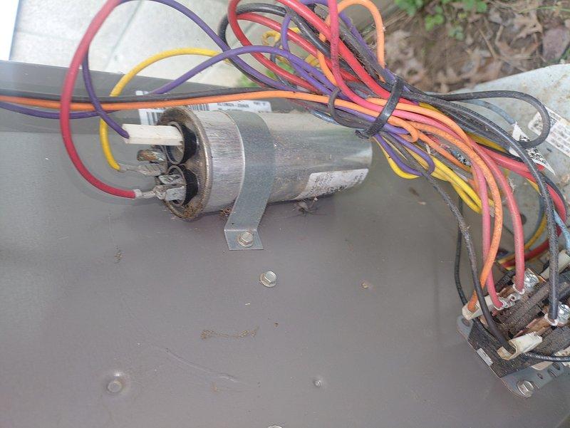 Completed comprehensive tune-up on 9-year-old air conditioning system. Inspected electrical components including dual run capacitor and associated wiring connections, verified proper wire terminations and mounting hardware integrity. Evaluated outdoor condensing unit installation, checked refrigerant line insulation condition, and confirmed disconnect box operation and exterior mounting security.