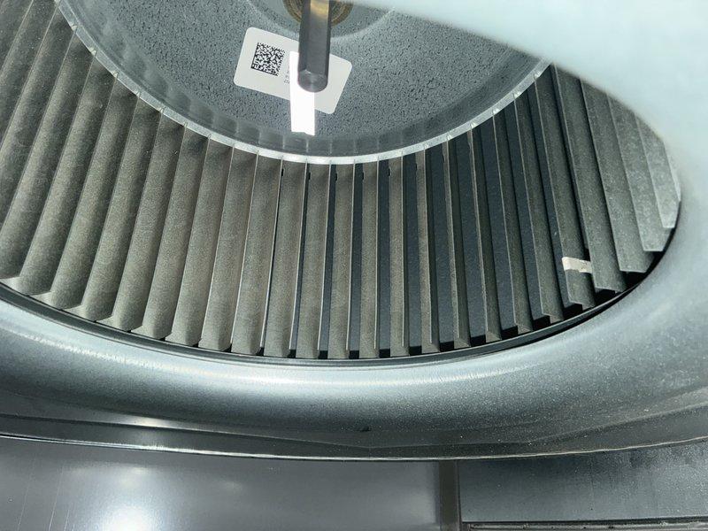 Completed MVP cooling maintenance visit on 5-year-old system. Inspected blower wheel assembly, which showed clean condition with no visible wear, debris accumulation, or mechanical damage. Evaluated air filter in housing unit, noting moderate dust accumulation and discoloration consistent with normal operation; filter remains serviceable but approaching replacement interval. All accessible components functioning within normal parameters.