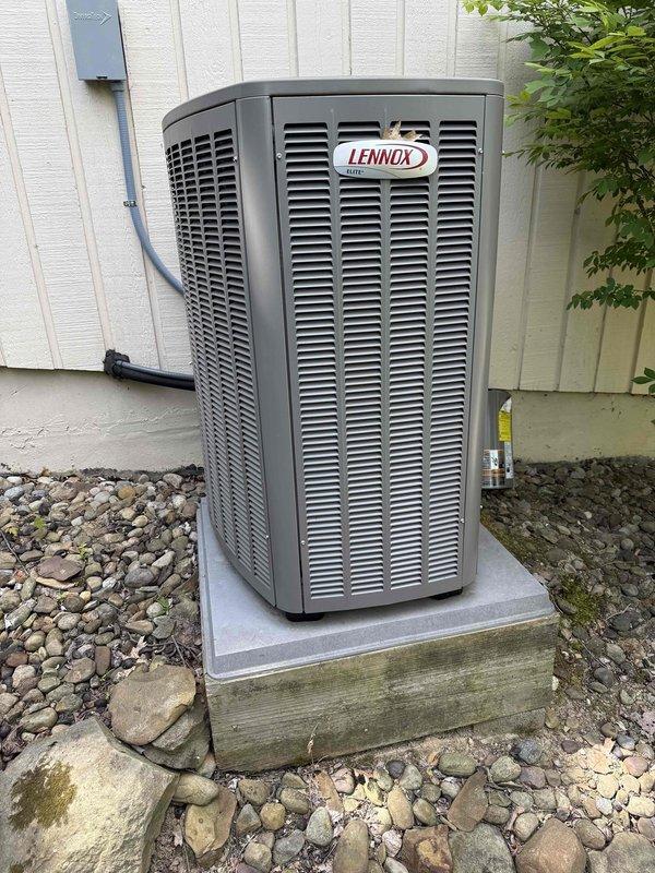 Completed routine cooling maintenance on 1-year-old Lennox condenser unit. Performed comprehensive system inspection including electrical connections, control panel components, and exterior cabinet condition. All wire terminations, relays, and safety controls verified secure and functioning properly. Unit operating within normal parameters with no deficiencies noted.