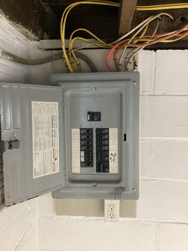 Responded to service call for 220V dryer outlet that shorted out during initial dryer installation at older single-family residence with updated electrical system. Investigated suspected ground wire issue between outlet and breaker panel in basement. Inspected electrical panel, circuit breakers, and associated wiring connections. Traced circuit from panel to dryer outlet location, verified proper wire routing and terminations. Tested voltage and continuity at outlet and panel to identify fault. Corrected improper ground wire connection and ensured proper circuit protection. Verified all connections secure at both outlet and breaker panel. Tested repaired circuit under load to confirm safe operation. System restored to proper working condition with no safety hazards present.