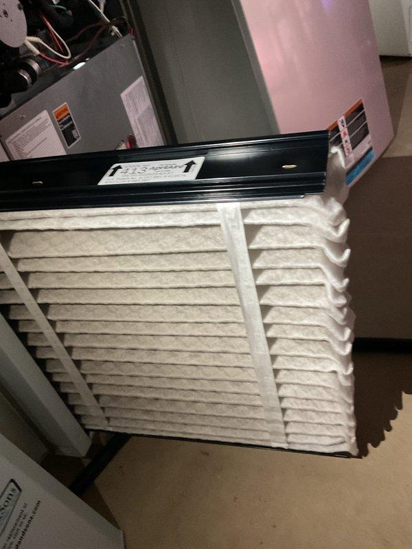 Completed scheduled MVP cooling maintenance visit on 3-year-old HVAC system. Inspected evaporator coil assembly and found unit in good operating condition with clean coil surfaces showing proper airflow pattern through diamond mesh media. Removed and inspected air filter, which showed minimal debris accumulation; reinstalled pleated filter in proper orientation within mounting bracket to ensure optimal system performance and air quality.