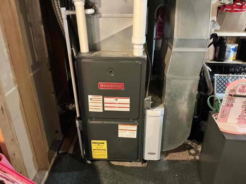 Conducted comprehensive on-site evaluation for complete HVAC system replacement at residential property. Assessed existing Goodman furnace unit located in basement utility area and outdoor air conditioning condenser unit positioned in side yard service area. Documented current equipment conditions, installation configurations, ductwork connections, electrical service routing, and clearance requirements. Provided detailed replacement estimate including equipment specifications and installation scope for new heating and cooling system.