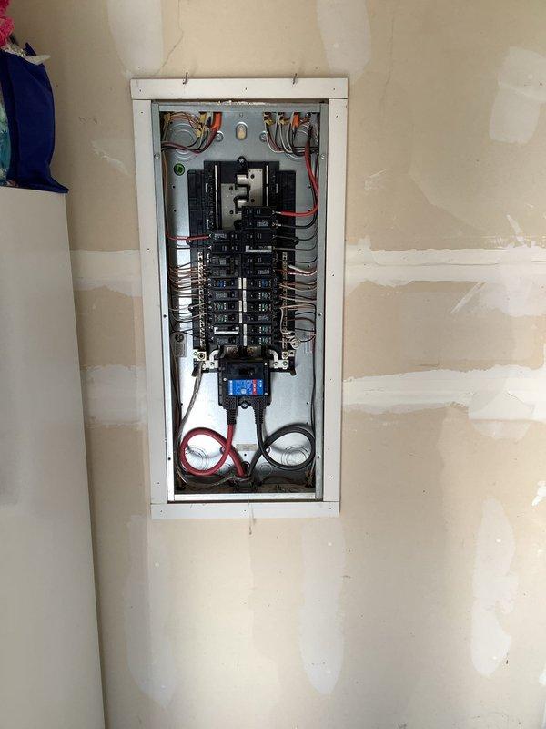 Installed new electrical circuit from main breaker panel to basement area in six-year-old residential property. Ran dedicated line through wall cavity, completing necessary drywall penetration and wire routing to unfinished basement space. All connections made to code with appropriate breaker installation in main panel, circuit tested and verified operational.