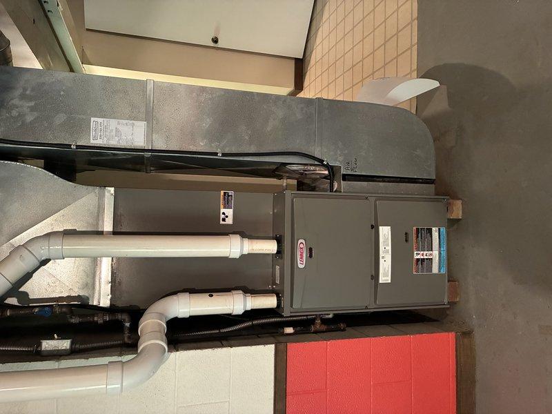 Completed scheduled MVP cooling maintenance visit on 6-year-old commercial air handler system. Performed comprehensive inspection of unit and associated ductwork, verified proper operation of control panel and digital displays, and conducted electrical diagnostics including amperage measurements on capacitor components to ensure system performance within manufacturer specifications.