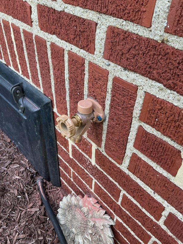 Repaired two dripping exterior hose bibs and replaced a faulty shut-off valve located at the back corner of the residence. The shut-off valve replacement was performed in the attic/ceiling space where the copper supply line was accessed, requiring work among the wooden framing and insulation. All exterior faucets were tested for proper operation and leaks were eliminated upon completion.