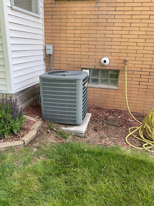 Performed preventative maintenance on 22-year-old residential air conditioning system. Completed comprehensive tune-up including inspection of outdoor condenser unit, capacitor testing and evaluation, refrigerant line connections, and electrical components. All system components operational at time of service completion.