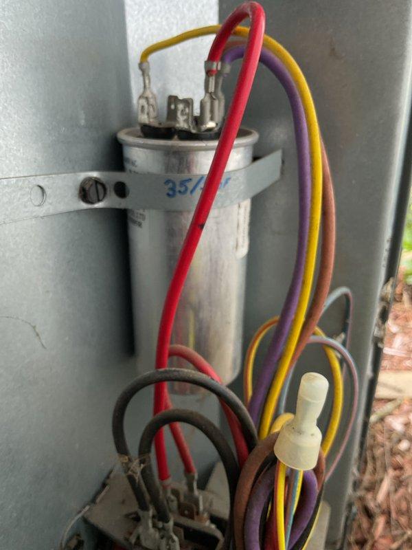 Performed preventative maintenance on 22-year-old residential air conditioning system. Completed comprehensive tune-up including inspection of outdoor condenser unit, capacitor testing and evaluation, refrigerant line connections, and electrical components. All system components operational at time of service completion.