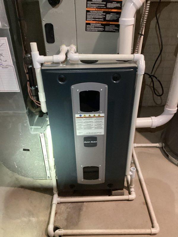 Completed MVP Cooling Visit recurring maintenance service on residential HVAC system. Performed comprehensive inspection of teal air handler unit, furnace, and associated Aprilaire whole-home humidifier. Verified proper operation of all equipment, inspected PVC condensate drain lines for blockages, checked electrical connections, and documented system condition through photographic records to ensure optimal cooling performance for the upcoming season.