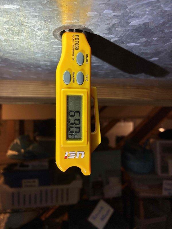 Completed MVP cooling maintenance visit at secondary service location. Performed comprehensive system inspection including temperature differential measurements across ductwork using calibrated digital thermometer, recording 88.8°F reading at supply plenum. Inspected and evaluated blower wheel assembly, noting normal operational dust accumulation on squirrel cage fan blades with no structural concerns or performance degradation. All components functioning within manufacturer specifications.