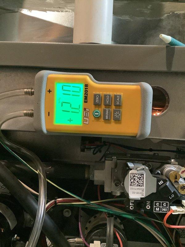 Responded to furnace lockout issue with error code that would clear when access panel was removed. Upon arrival, performed diagnostic testing and measured supply air temperature at 72°F. Inspected inducer motor assembly and associated wiring connections, which appeared to be the source of the intermittent fault. Determined that door safety switch was likely causing nuisance shutdowns due to improper contact or alignment. Verified all electrical connections were secure and tested system operation through multiple cycles with panel properly installed to confirm reliable operation without further error codes.