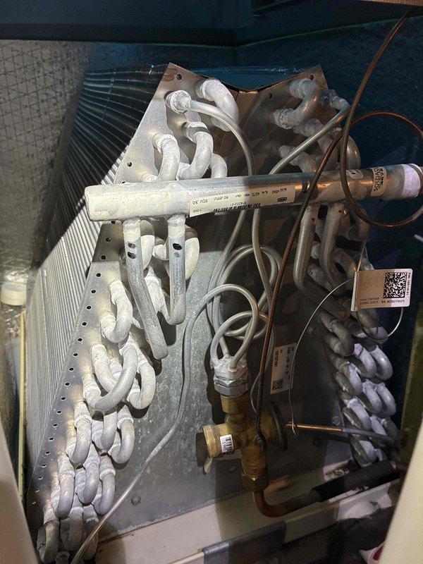 Performed comprehensive cooling system maintenance on residential HVAC unit. Thoroughly cleaned heavily soiled outdoor condenser coil which had significant accumulation of dirt, dust, and debris between fins that was restricting airflow and reducing system efficiency. Inspected indoor evaporator coil assembly, refrigerant lines, copper piping, electrical connections, and associated components to ensure proper operation and system integrity.