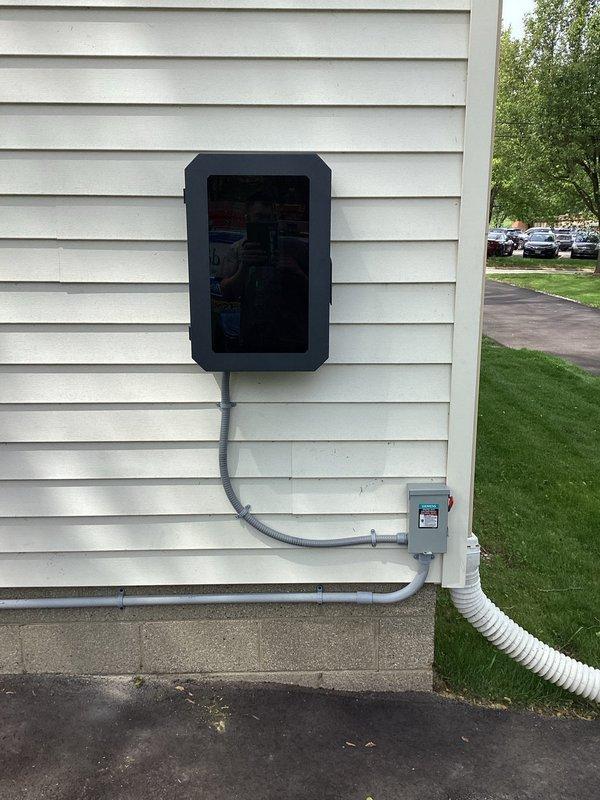 Installed a 200 amp meter main disconnect combo with exterior service upgrade, running SER cable into the existing panel with proper ground bar installation and separation of ground and neutral conductors. Installed a dedicated 60 amp circuit using #6 copper wire routed around the exterior of the structure to the driveway for an electric vehicle charger, including a disconnect at the charging location. Upgraded the main electrical grounding system to current code requirements, including installation of new ground rods, hot water tank bonding, and main waterline grounding, and added a whole home surge protector to protect the electrical system.