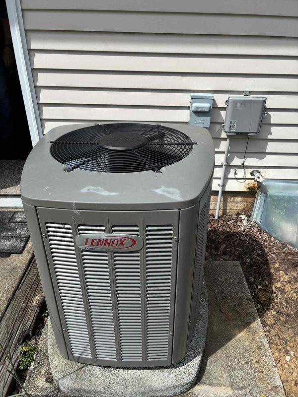 Completed MVP cooling maintenance visit on Lennox outdoor condensing unit. Performed thorough inspection of evaporator coil assembly, refrigerant distribution lines, and heat exchanger components, noting surface oxidation and mineral deposits on copper tubing consistent with normal system operation. Verified condenser unit exterior condition, confirmed proper installation on concrete pad, and documented electrical disconnect and control boxes mounted on building exterior. All system components functioning within normal parameters with no immediate service requirements identified.