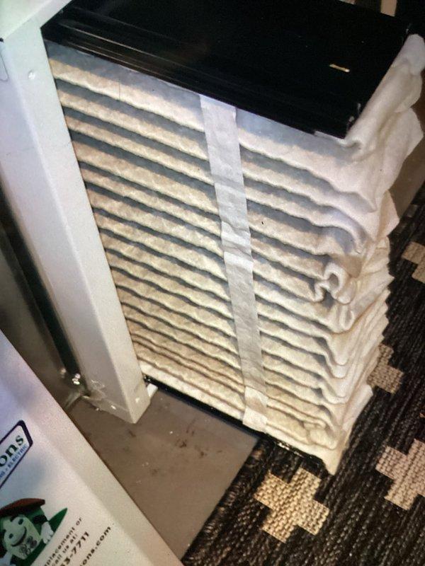 Completed scheduled MVP cooling maintenance visit on a 3-year-old portable air conditioning unit. Inspected unit operation, documented visible dust accumulation on exterior vents and housing, and examined ductwork showing condensation present on metal surfaces. Photographed equipment condition for service records.