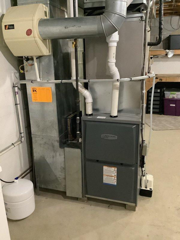 Completed MVP cooling maintenance visit on 14-year-old residential HVAC system that had been rescheduled from previous date. Performed standard preventive maintenance inspection of furnace, air handler, ductwork, and associated components including humidifier system. All equipment found operating within normal parameters with proper labeling and safety stickers intact.