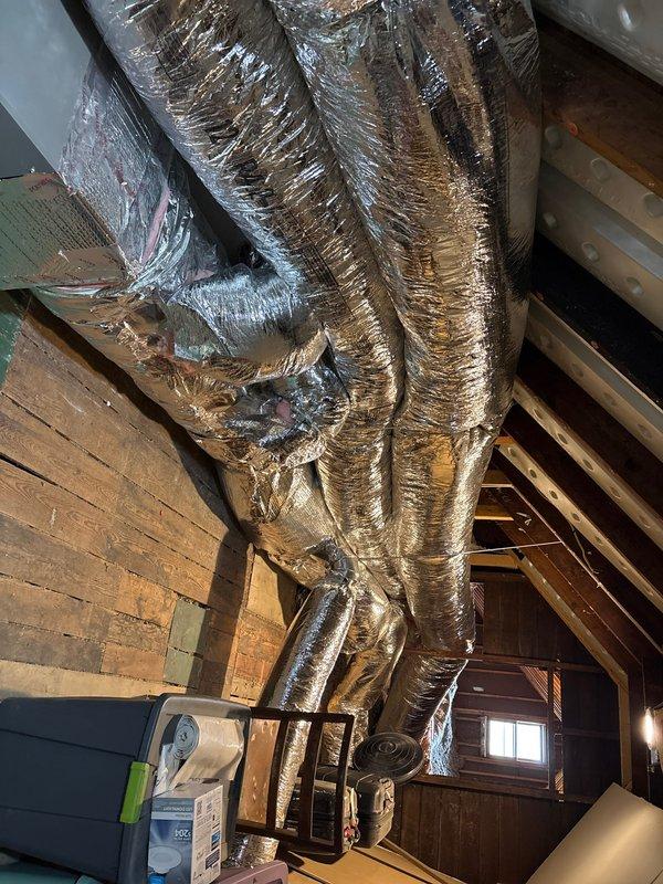 Completed installation of flexible insulated HVAC ductwork in attic space, routing and connecting all remaining duct runs to air handler unit. Installed flue pipe for proper combustion venting and performed system startup procedures, including operational testing and safety verification. Installed Kidde carbon monoxide alarm to ensure occupant safety and code compliance.