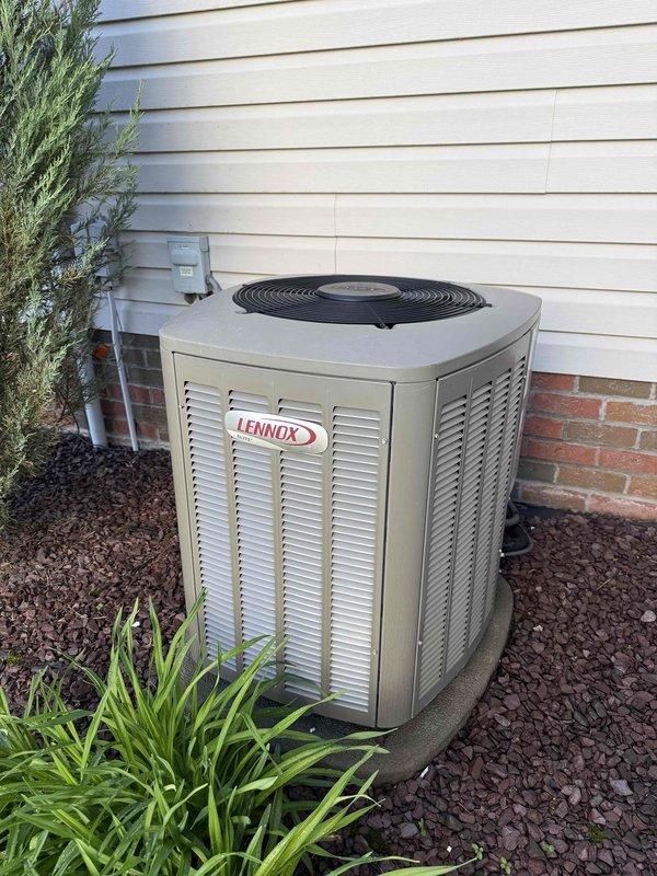 Completed preventative maintenance cooling visit on 9-year-old Lennox air conditioning system. Inspected outdoor condenser unit, verified proper operation, and examined condenser coil fins which were found to be clean and in good condition with proper airflow. Unit operating within normal parameters with no issues identified.