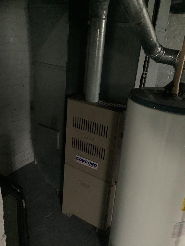 Conducted on-site evaluation for add-on air conditioning system to existing Concord furnace installation in residential basement mechanical room. Assessed current HVAC infrastructure including ductwork configuration, available space for evaporator coil placement, electrical service capacity, and optimal refrigerant line routing to exterior condensing unit location. Documented existing forced-air heating system and determined compatibility requirements for integrated cooling system installation.