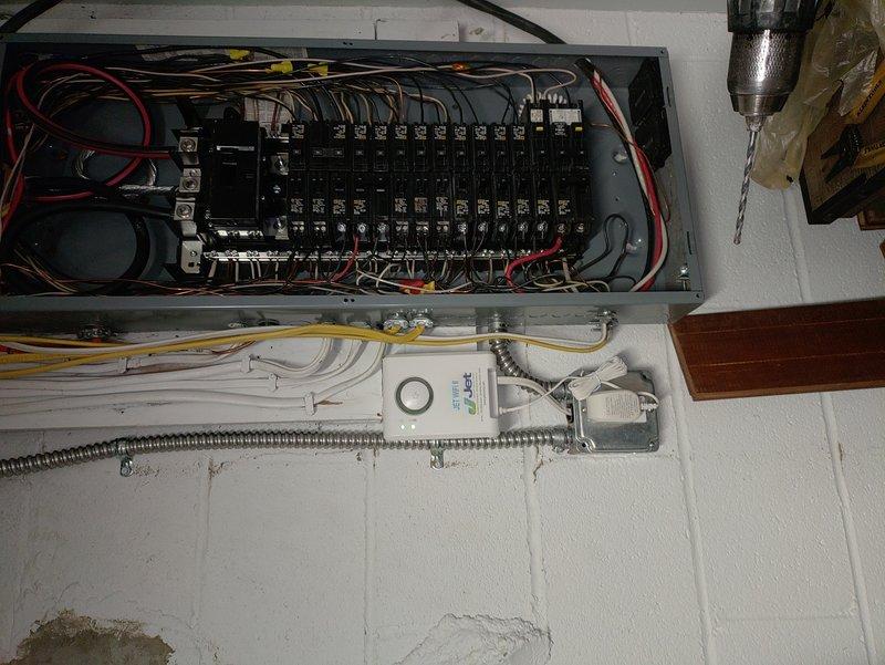 Completed electrical wiring installation for new septic system by running circuit from main electrical panel to exterior location. Installed new circuit breaker in panel, routed multi-conductor cable through wall penetration using flexible metal conduit, and secured all connections per code requirements. All wiring properly terminated and system tested for proper operation.