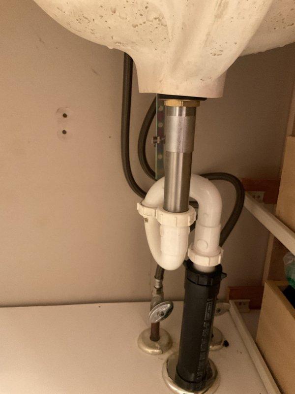 Installed new Moen three-handle shower valve in bathroom shower enclosure and mounted new Moen faucet assembly to laundry sink with complete drain and supply line connections. Coordinated parts procurement and staging for American Standard toilet installation, with all components received and prepared for installation. All fixtures tested for proper operation and verified leak-free connections upon completion.
