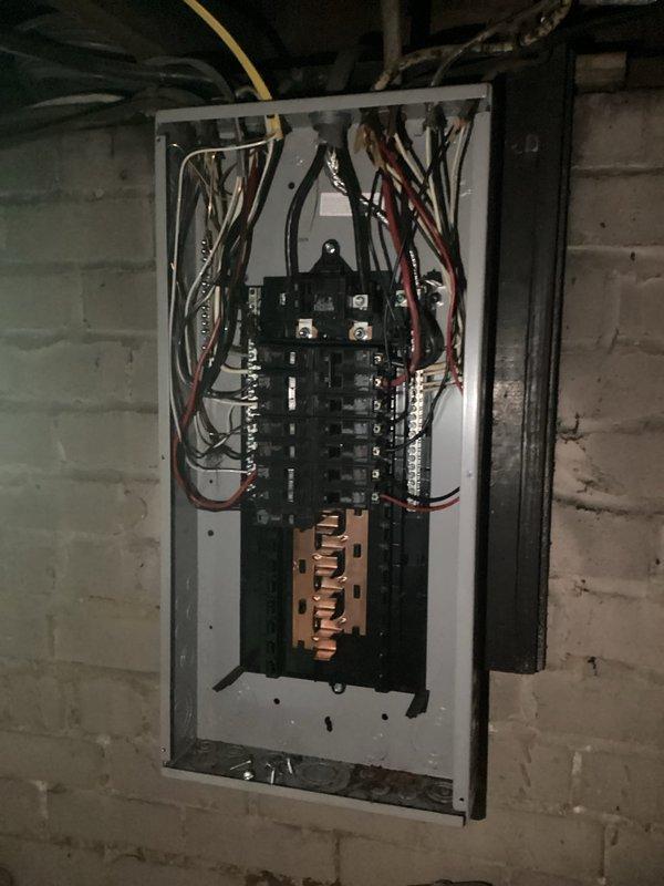 Responded to service call for circuit breaker tripping issue affecting kitchen appliances. Inspected existing electrical panel and identified overloaded circuit serving both refrigerator and microwave causing repeated trips. Assessed electrical load requirements and panel capacity, documented current wiring configuration and breaker arrangement. Communicated findings and recommended installation of dedicated circuit for microwave to resolve nuisance tripping and ensure safe operation of kitchen appliances.