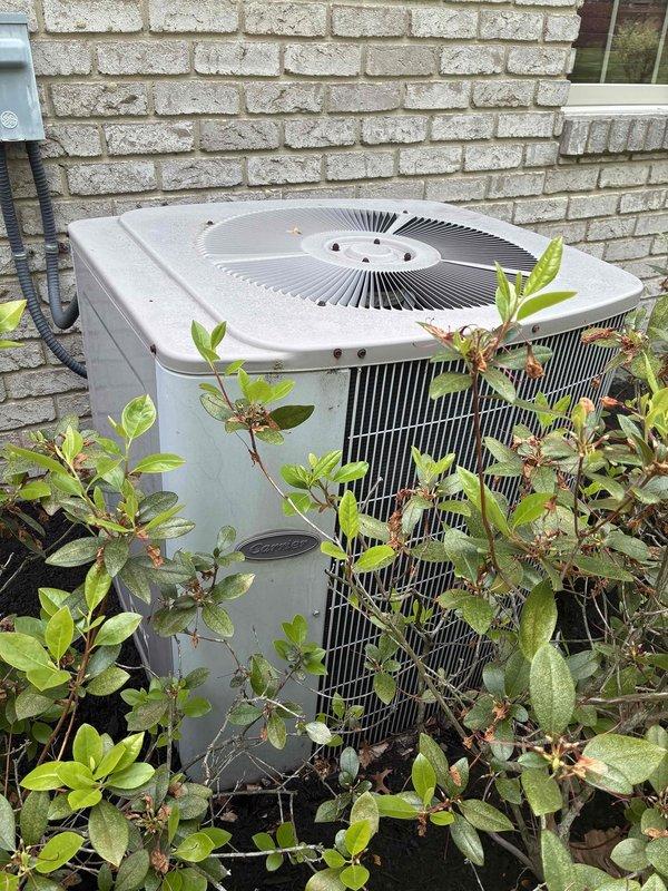 Completed scheduled MVP cooling maintenance visit on Carrier Weather Maker 9200 ultra-efficient gas furnace system with Space Guard high-efficiency air cleaner. Replaced April Aire filter media (STK#201) as requested. Inspected outdoor condensing unit positioned against exterior brick wall, noting vegetation growth around base that may require future clearance for optimal airflow. Verified electrical connections at junction box and indoor components, documented system condition with photos, and confirmed all equipment operating within normal parameters.