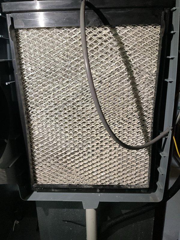 Completed preventive maintenance on 5-year-old air conditioning system. Inspected and verified proper refrigerant levels using digital manifold gauge, recording superheat measurement of -6.5°F on suction line. Examined air filter showing clean condition with no replacement required at this time. Verified proper airflow through evaporator coil and inspected refrigerant line insulation for integrity. System operating within normal parameters with no deficiencies noted.
