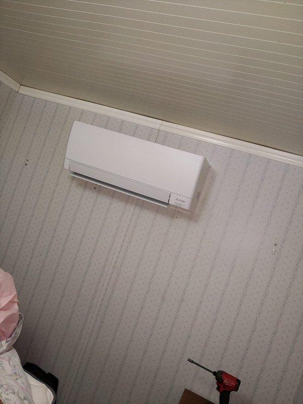 Completed installation of a 3-head ductless mini-split system in residential property. Mounted three indoor air handler units on interior walls in separate rooms, routing refrigerant line sets and electrical connections through attic space to outdoor condensing unit. All units tested and operational upon completion.