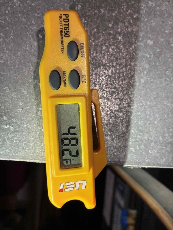 Completed scheduled cooling maintenance on 9-year-old Lennox HVAC system. Performed comprehensive inspection of furnace and air handler unit, verified proper operation of all components, checked refrigerant temperatures with digital thermometer showing -8.9°F reading, inspected condensate drainage lines and PVC venting, and documented equipment condition with photographs for maintenance records.