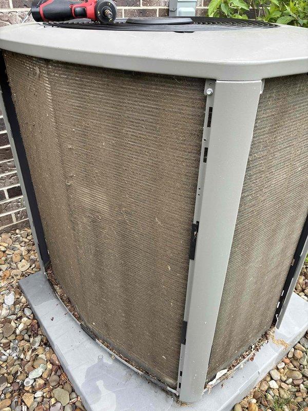 Completed scheduled MVP cooling maintenance visit on outdoor condensing unit. Upon arrival, observed significant dirt and debris accumulation on mesh filter screens affecting airflow efficiency. Performed comprehensive system inspection, cleaned condenser coils and protective screens, verified proper operation of all mechanical components, and ensured adequate clearance around unit. System restored to optimal operating condition with improved airflow through cleaned filters.