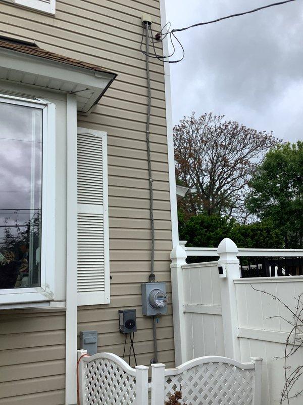 Replaced damaged service cable running from meter base to main electrical panel. Investigated and resolved recurring breaker tripping issue by identifying faulty conductor connection at service entrance. Secured all exterior conduit and verified proper grounding at meter enclosure.