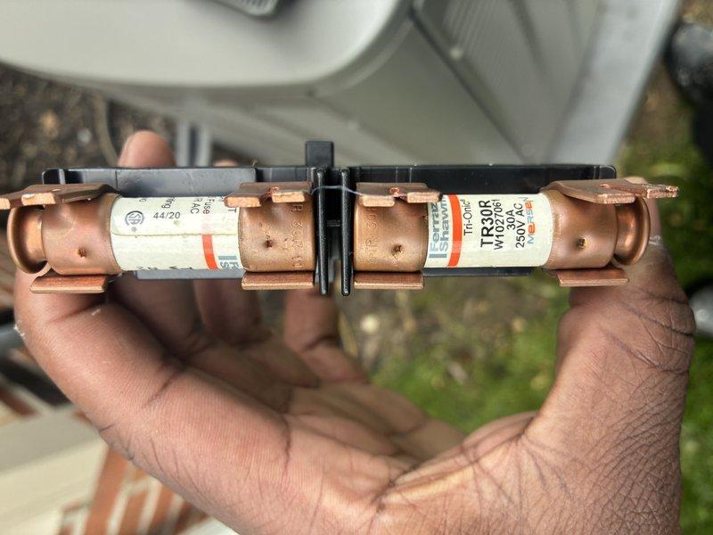 Completed scheduled air conditioning maintenance visit on a 5-year-old cooling system. Performed electrical diagnostics using clamp meter to verify proper amperage draw and system performance. Inspected and tested dual fuse assembly, confirming electrical protection components were functioning within manufacturer specifications.