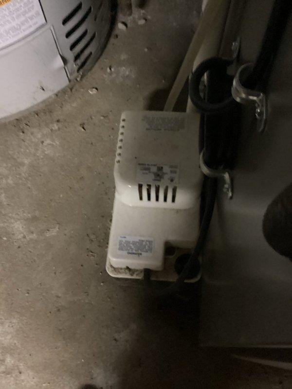 Performed preventive maintenance inspection on residential air conditioning system. Evaluated condensate pump operation and drainage system functionality, verified proper discharge through connected piping. Conducted diagnostic measurements on HVAC unit using digital temperature monitoring equipment to assess system performance and airflow characteristics.