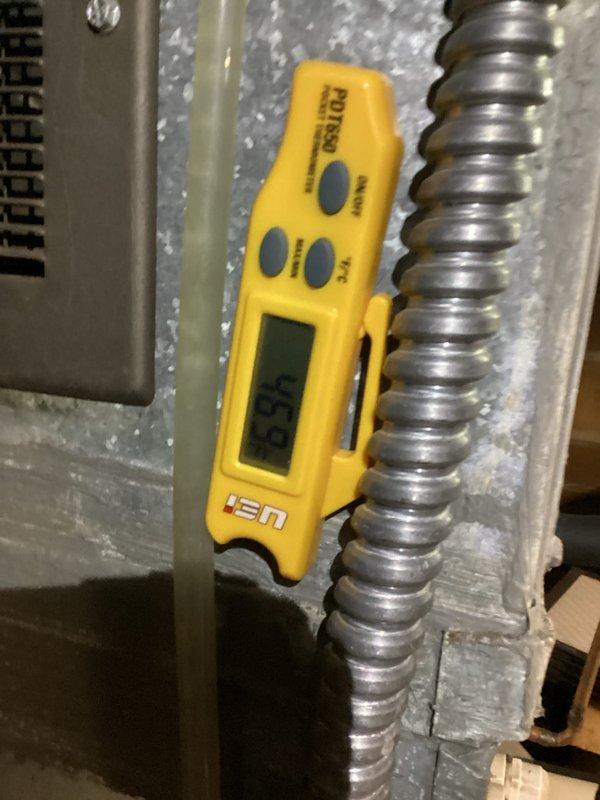 Performed preventive maintenance inspection on residential air conditioning system. Evaluated condensate pump operation and drainage system functionality, verified proper discharge through connected piping. Conducted diagnostic measurements on HVAC unit using digital temperature monitoring equipment to assess system performance and airflow characteristics.