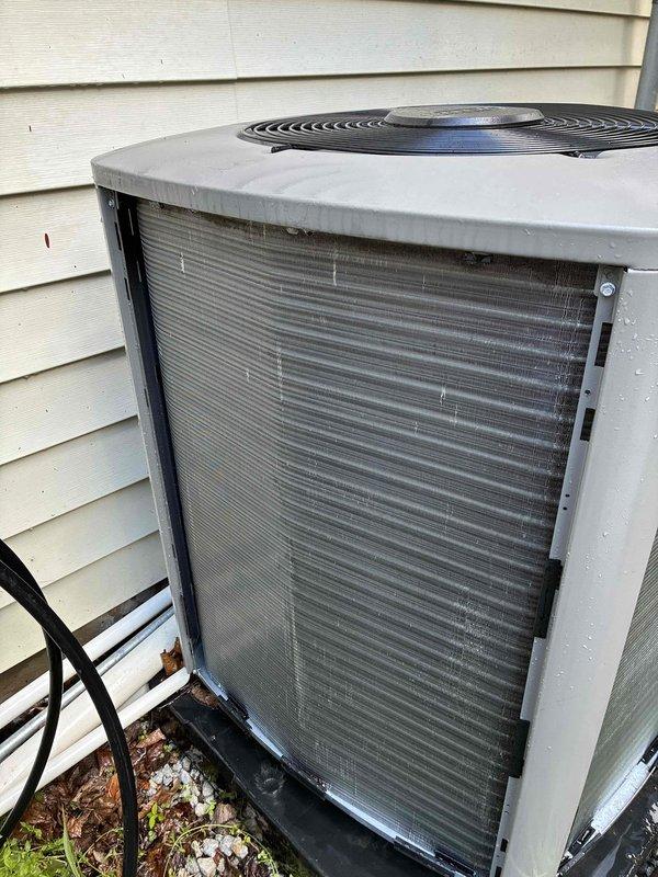 Completed routine AC maintenance visit for cooling system. Inspected outdoor condenser unit and found it in operational condition with clean coils and proper airflow through protective grille. Examined air filter element which showed minimal dust accumulation and remains in serviceable condition.