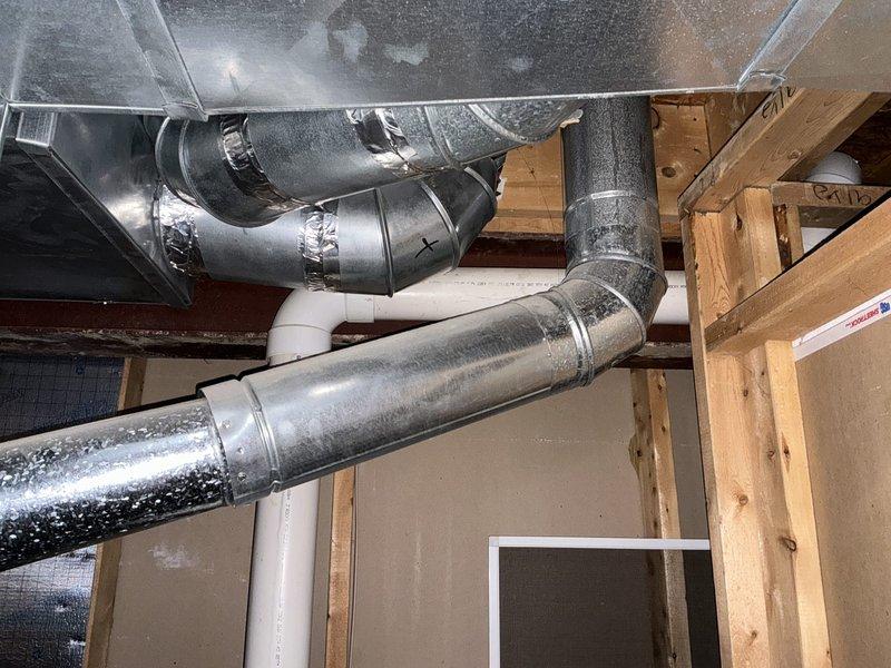 Provided comprehensive estimate for replacement of 23-year-old gas furnace and air conditioning system with confirmed refrigerant leak in existing AC unit. Assessment included evaluation of current Carrier furnace installation, inspection of ductwork showing significant condensation issues, and discussion of additional equipment options including humidifier and salt-free water softening system to address customer's specific requirements.