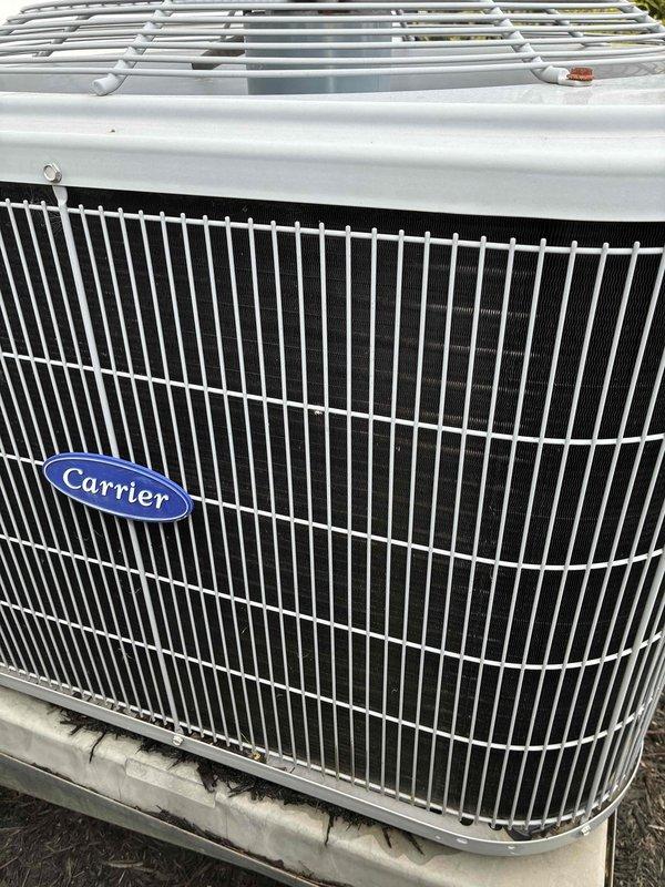 Completed scheduled MVP cooling maintenance visit on Carrier brand air conditioning system. Performed comprehensive inspection of outdoor condenser unit, verified proper operation of electrical components including capacitor and contactor, and documented system condition with protective cage installation present above unit. All components found operating within normal parameters with no immediate service needs identified.