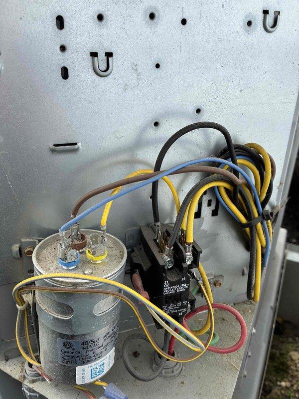Completed scheduled MVP cooling maintenance visit on Carrier brand air conditioning system. Performed comprehensive inspection of outdoor condenser unit, verified proper operation of electrical components including capacitor and contactor, and documented system condition with protective cage installation present above unit. All components found operating within normal parameters with no immediate service needs identified.