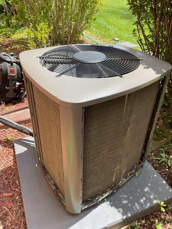 Performed routine cooling system maintenance inspection on residential air conditioning system with attic-mounted air handler and ground-level condenser unit. Accessed equipment, verified operational status of all components, and documented current system condition through photographic records. Unit operating within normal parameters at time of service.