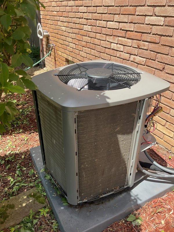 Performed routine cooling system maintenance inspection on residential air conditioning system with attic-mounted air handler and ground-level condenser unit. Accessed equipment, verified operational status of all components, and documented current system condition through photographic records. Unit operating within normal parameters at time of service.