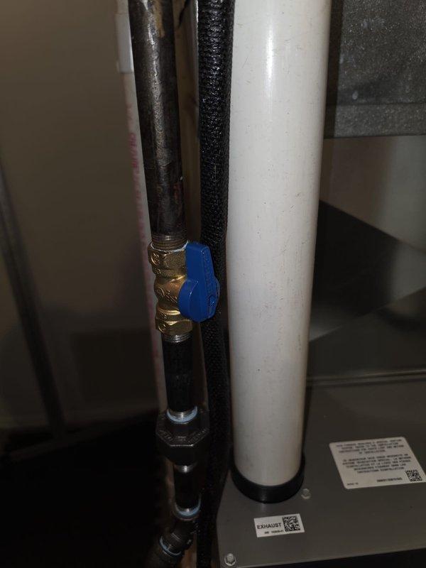 Completed installation of 90% AFUE furnace system with associated ductwork and venting components. Installed PVC exhaust venting, connected gas supply line with shutoff valve, and secured all ductwork connections using proper mounting brackets and flexible duct connectors with insulation. All components properly labeled and system tested for operation.