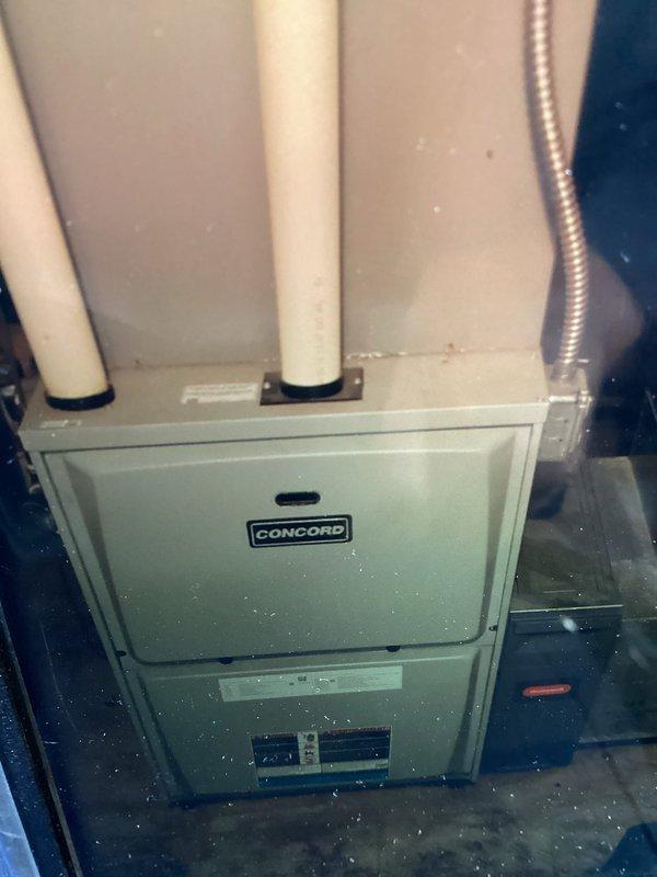 Responded to no-heat call on 10-year-old Concord furnace with functional AC and fan operation. Performed diagnostic inspection of unit and documented existing installation conditions including PVC venting and electrical connections. Customer advised of findings and system status.