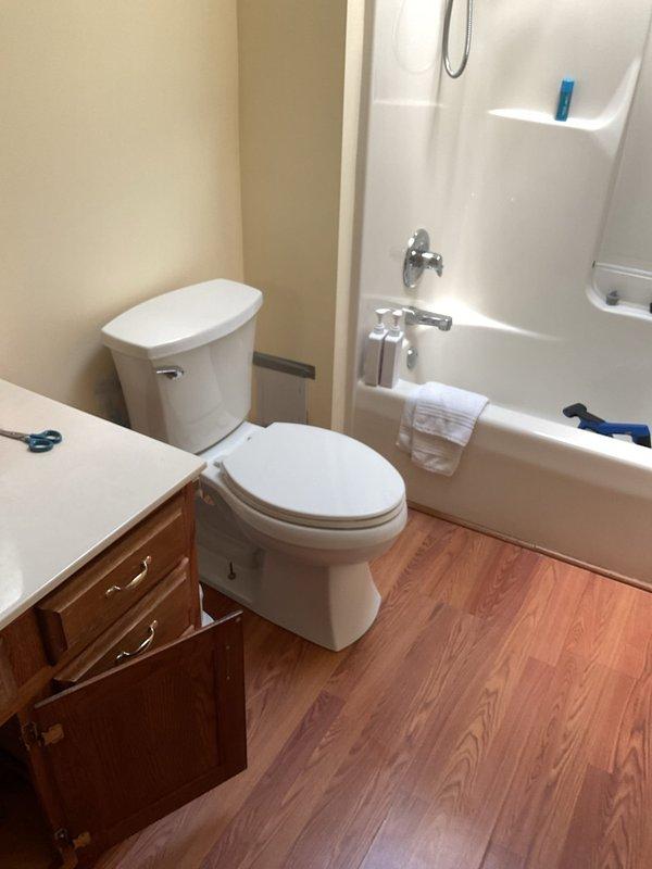 Responded to service call for three clogged sink drains on the second floor that were slowly draining. Upon arrival, found bathroom sink with standing water containing visible debris and particles, indicating drainage obstruction. Assessed plumbing system and cleared blockages from affected drain lines using appropriate tools and techniques. Verified proper water flow and drainage function was restored to all three sinks. Removed debris and tested fixtures to ensure complete resolution of the clogging issue.