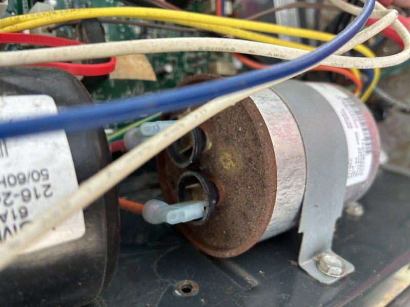 # HVAC Tune-Up Completed

Performed comprehensive tune-up on 2-year-old residential air conditioning system. During inspection, identified significant corrosion and oxidation on capacitor terminals, which could lead to premature failure if left unaddressed. Completed full system evaluation, verified electrical connections, and documented equipment condition with photographic evidence for customer records.