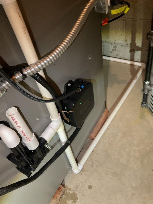 Completed recurring AC maintenance on residential cooling system. Performed comprehensive inspection of outdoor condenser unit, including cleaning of mesh screening panels, verification of fan operation through protective grille, and assessment of unit positioning on concrete pad. Inspected indoor mechanical components including condensate pump with operational indicator lights, PVC drain lines, flexible refrigerant lines, and associated plumbing connections in basement utility area. All components found operating within normal parameters with no immediate service needs identified.